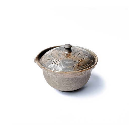 Top view of Akikusa Shiboridashi teapot on a white background