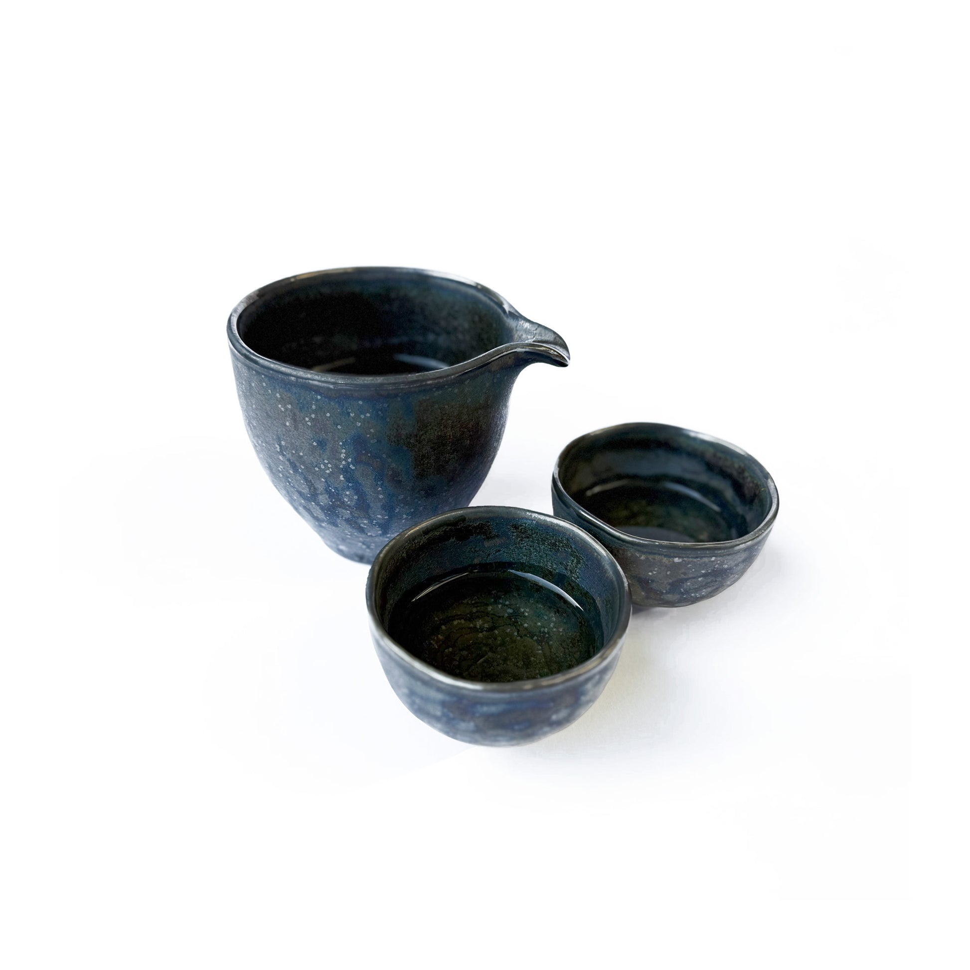 2 KOSAI cups stand next to the KOSAI Water Cooler