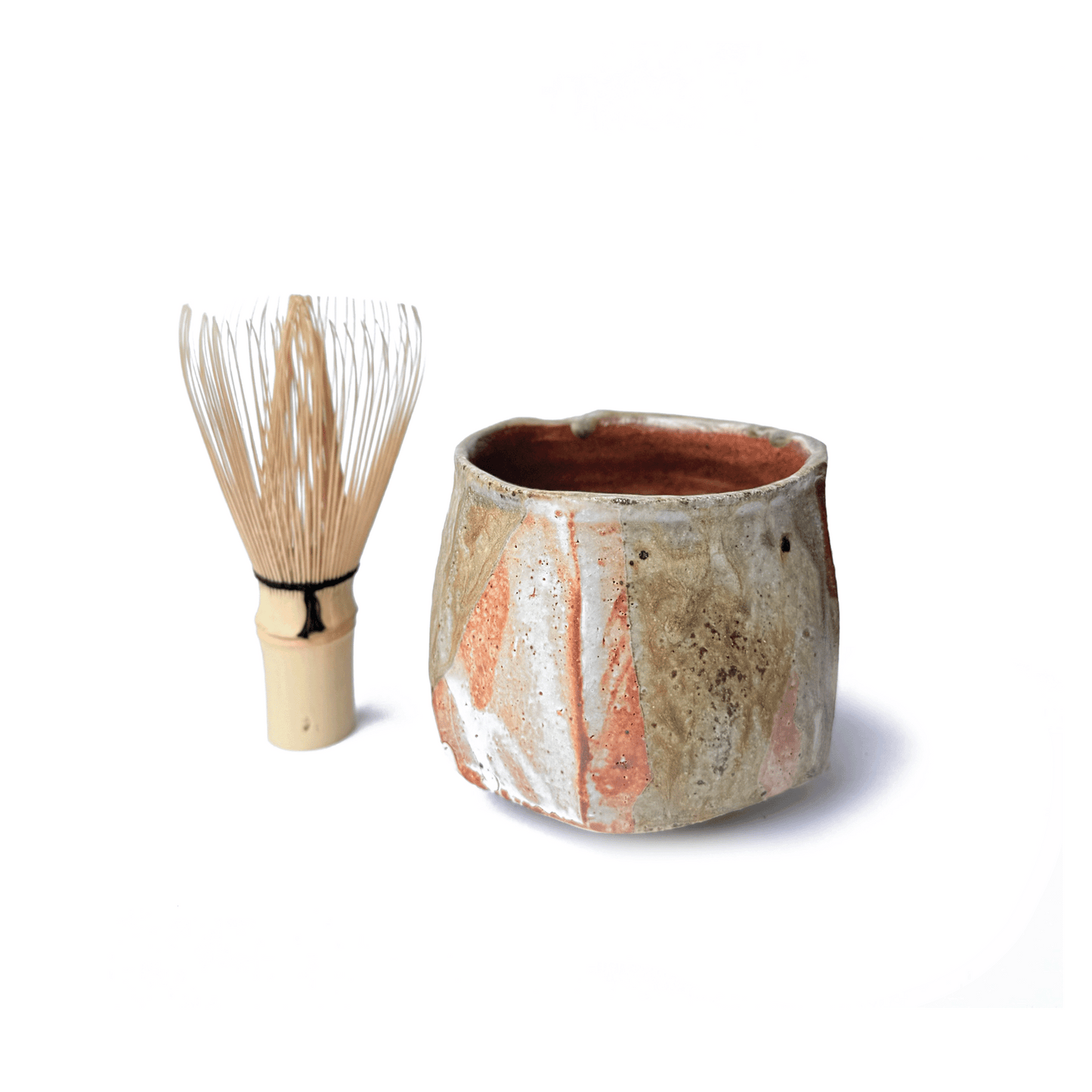 SHINO matcha bowl with bamboo matcha whisk on a white background
