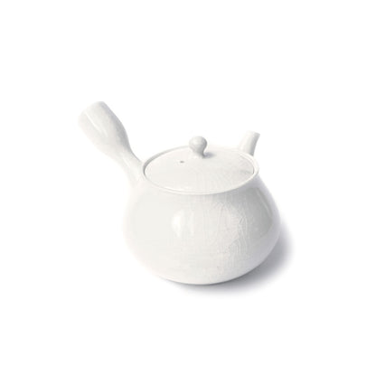 A small white ceramic teapot with a textured glaze, featuring a lid with a small knob, a curved handle, and a short spout, shown on a plain white background.