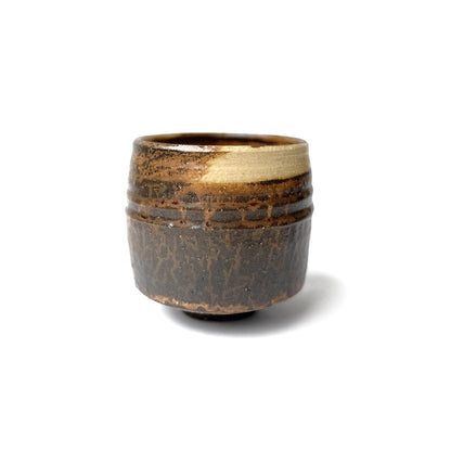 Ceramic matcha bowl  with a textured surface on a white background