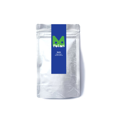 White packaging with SUGI label featuring a logo and text on a white background