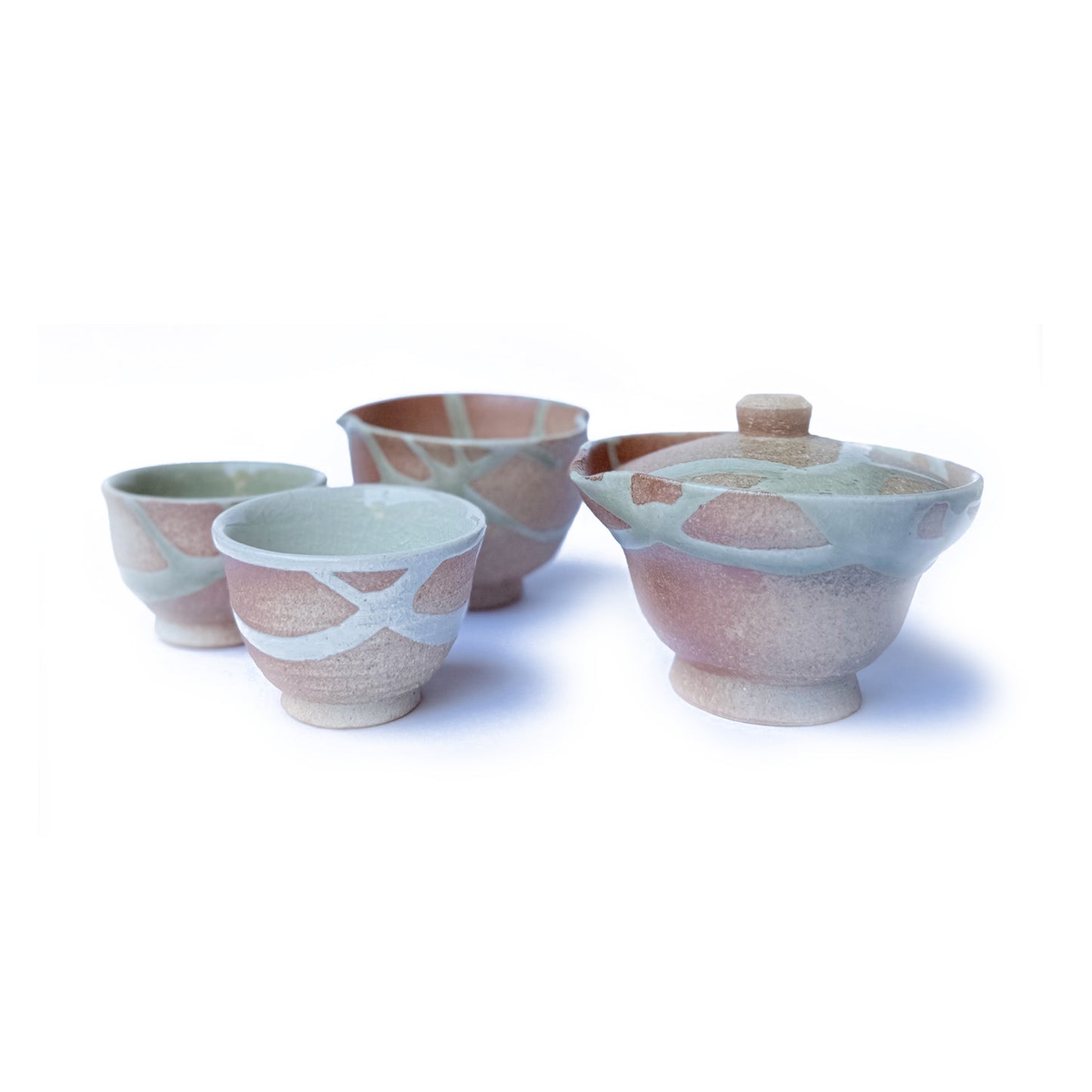 Set of ceramic bowls with abstract patterns on a white background