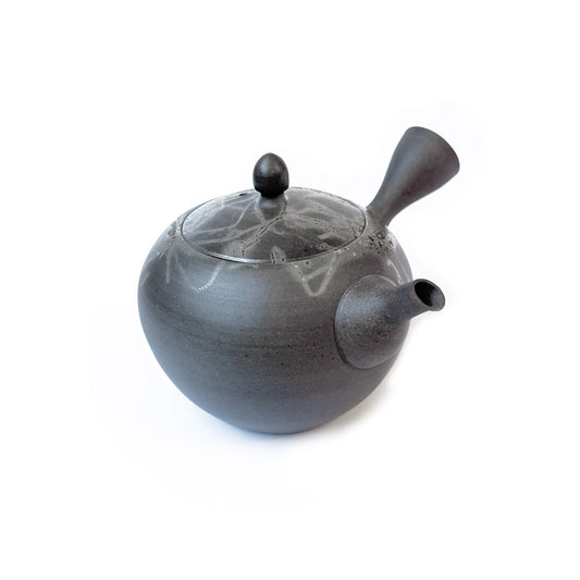 A handmade ceramic teapot with a rounded body, a short spout, and a lid with a small knob, shown on a plain white background.